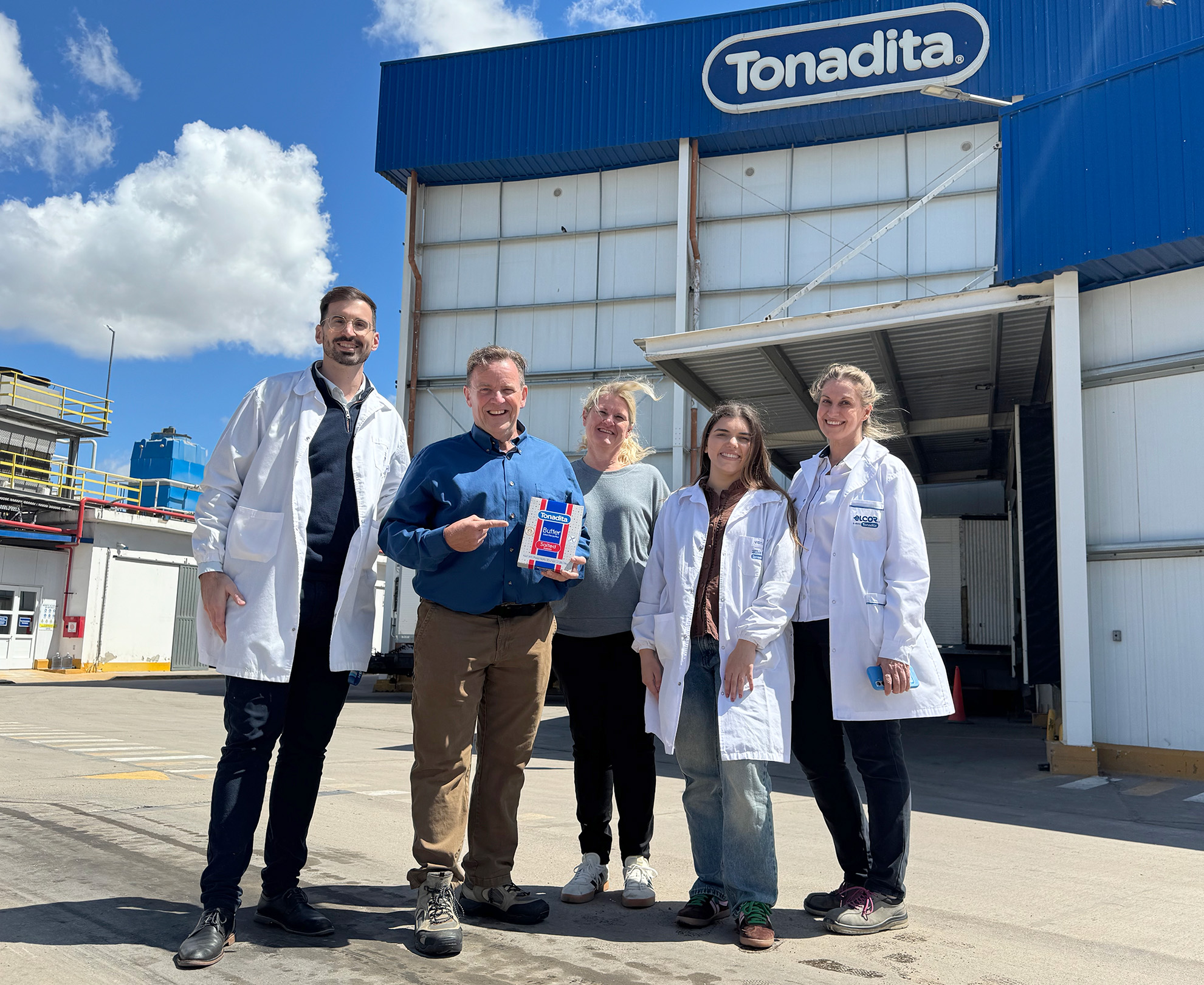 A photo of Kurt Goetzinger with his wife and the quality assurance team at Tonadita